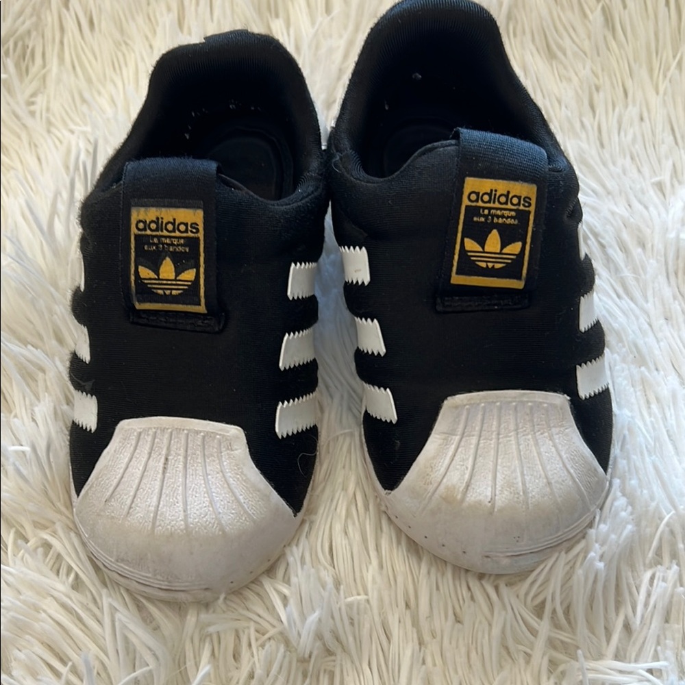 Adidas Black and White Superstar Sneakers with Iconic Shell Toe